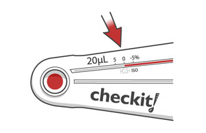 An arrow points to the measurement of the red liquid that has been drawn up a capilary